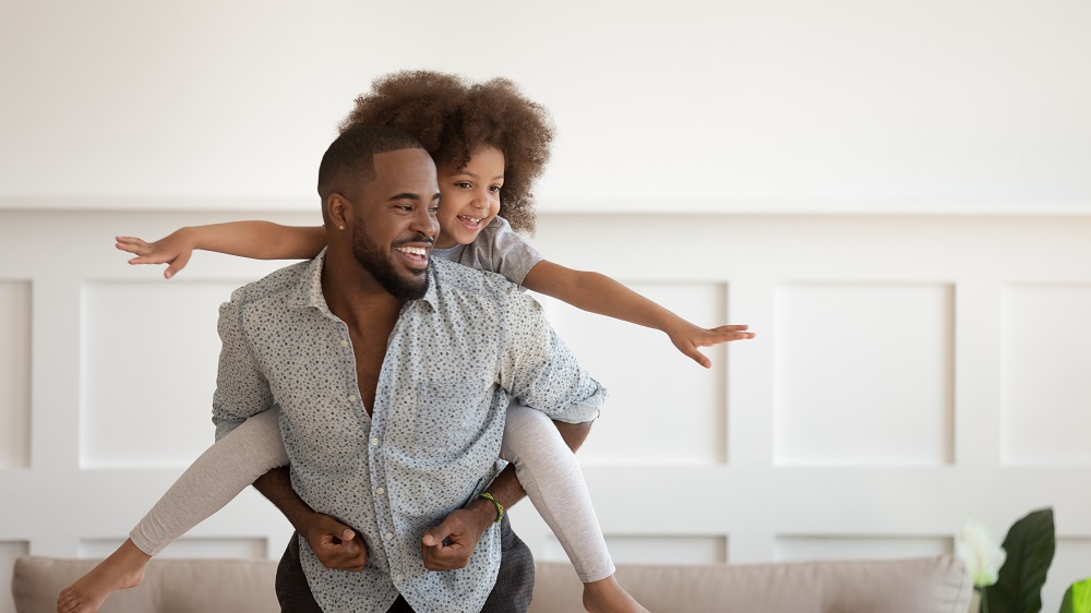 father and daughter having fun